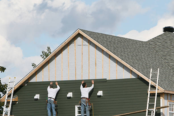 Professional Emergency Siding Repair technician working in Okeana, OH